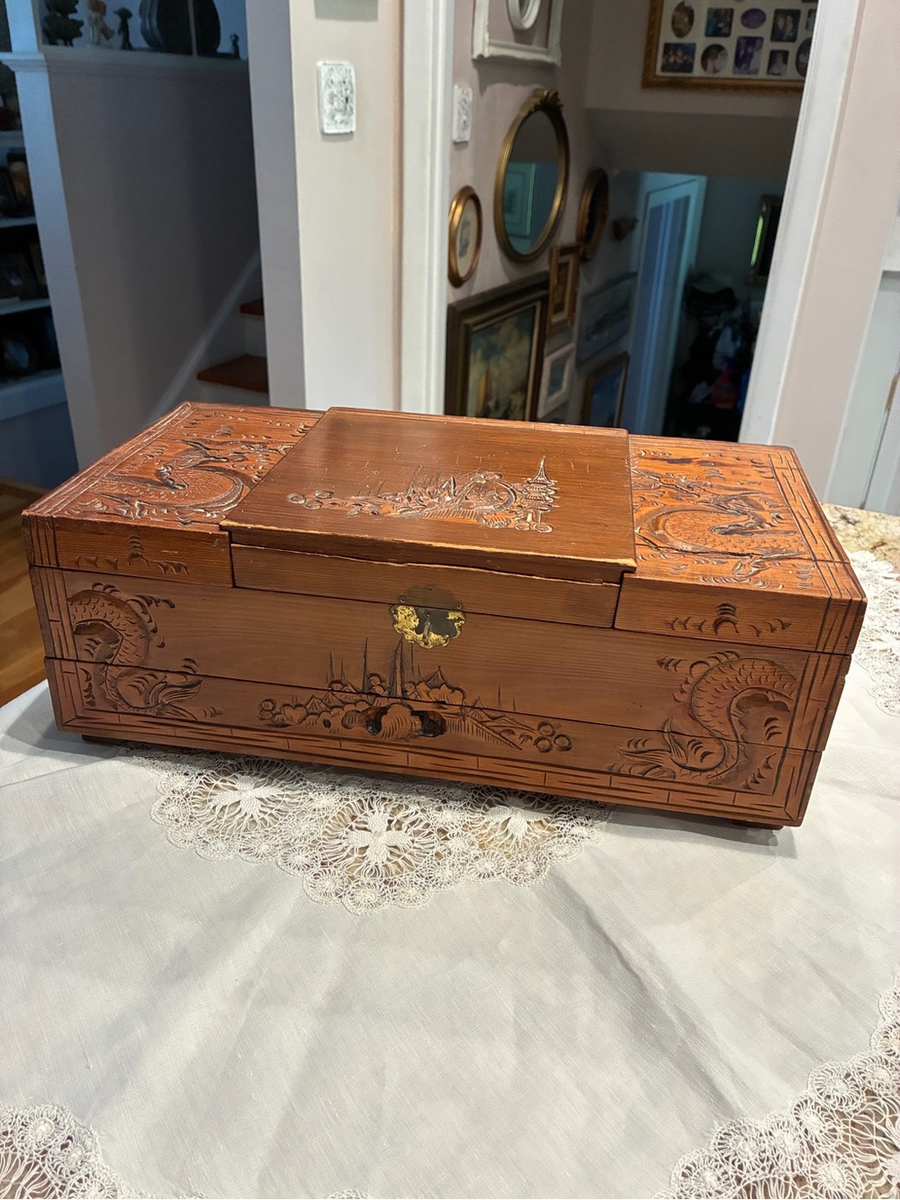 Vintage carved wooden Asian-style jewelry chest with foldout compartments